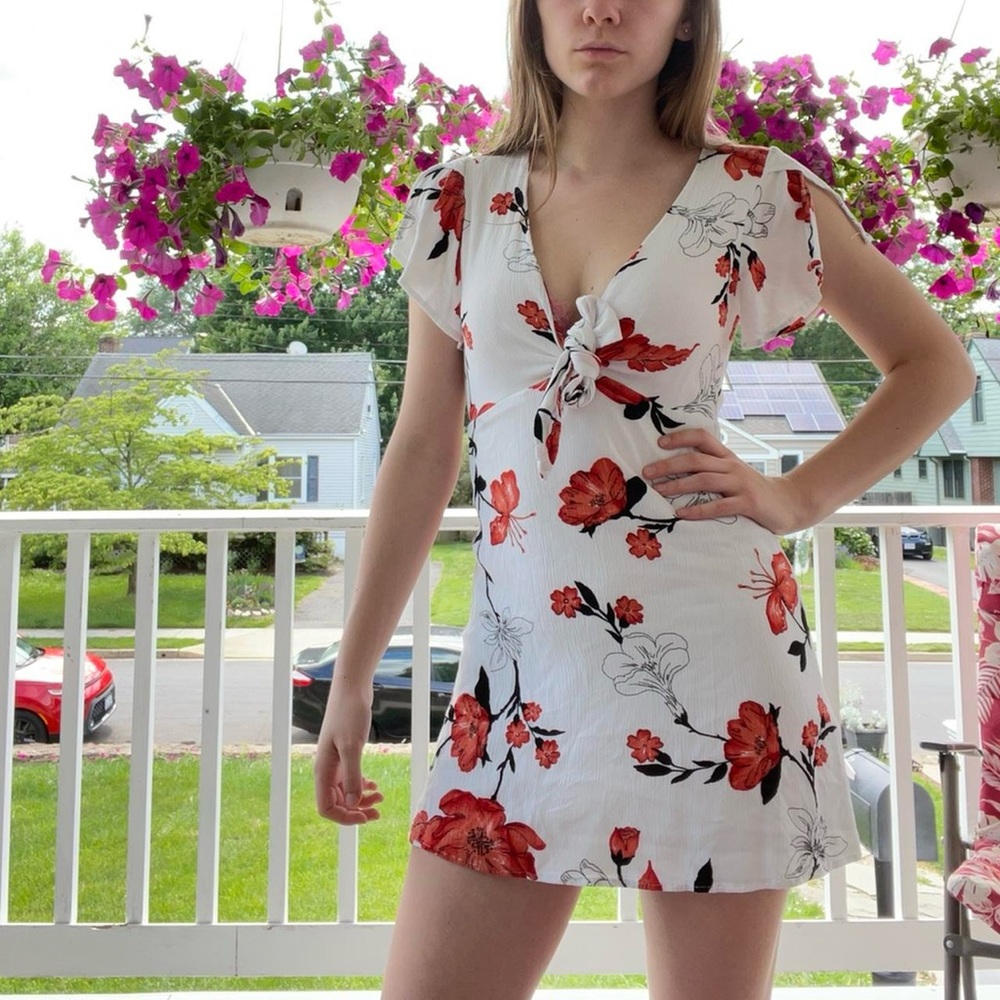 JustFab white floral mini dress.